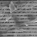 A scanning electron microscope (SEM) image of a layered porous GaN structure